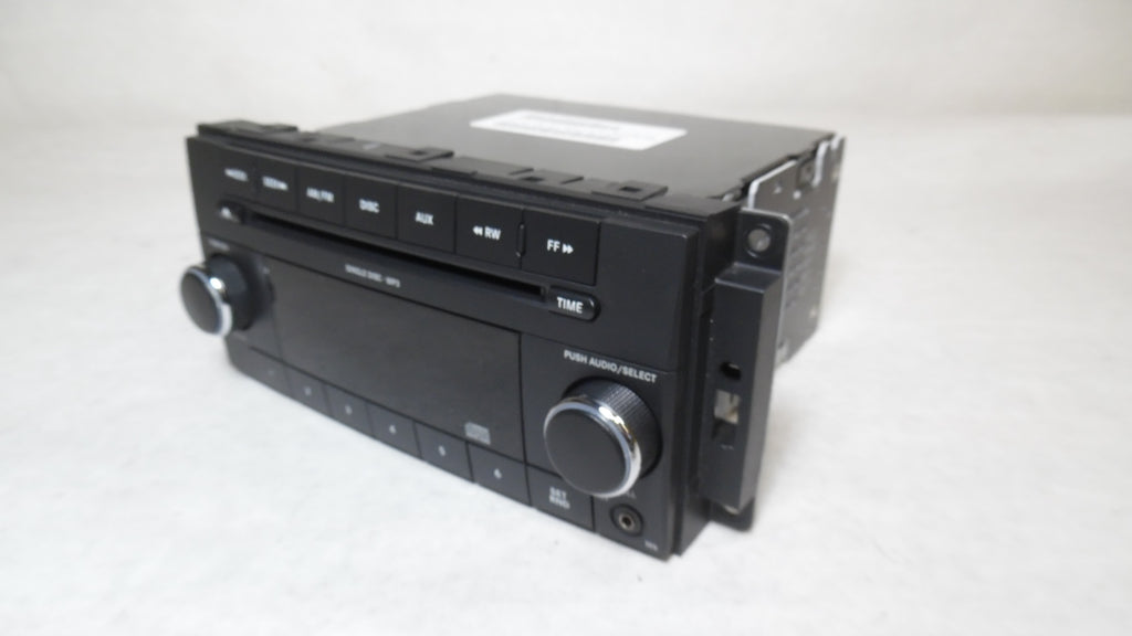 Pre-Owned 2009 2010 2011 Dodge Caravan CD MP3 Player Radio Receiver P1007
