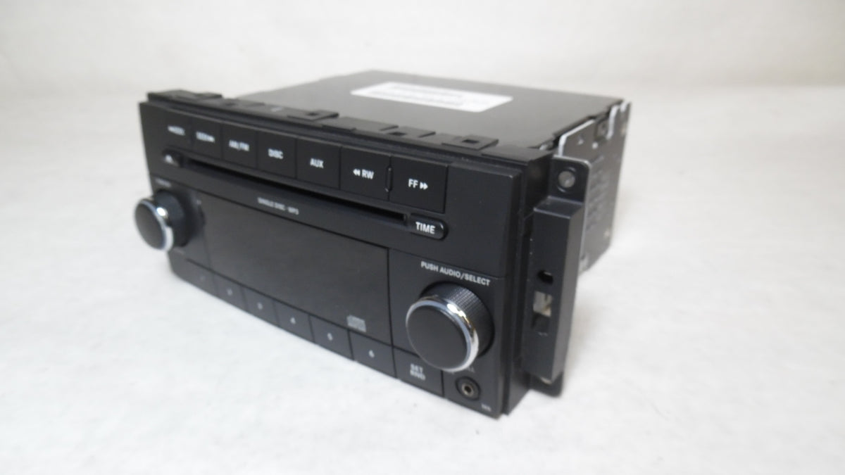 Pre-Owned 2009 2010 2011 Dodge Caravan CD MP3 Player Radio Receiver P1007